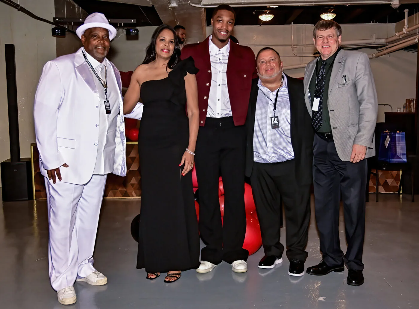 Lonnie Walker IV with honorees at the Community Appreciation Gala