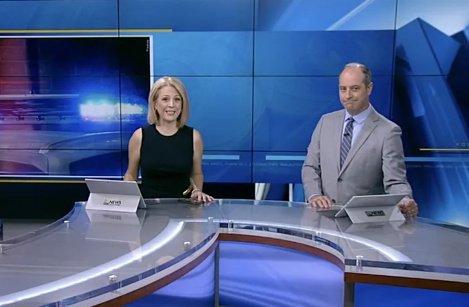 WFMZ news anchors reporting on the Lonnie Walker IV Foundation summer camp